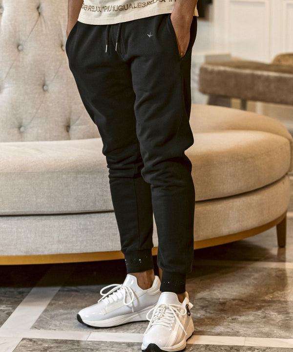 ウノピゥウノウグァーレトレリラックス　ラインストーンヘムスウェットジョガーパンツ