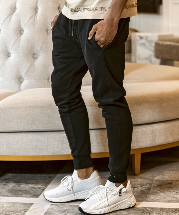 ウノピゥウノウグァーレトレリラックス　ラインストーンヘムスウェットジョガーパンツ