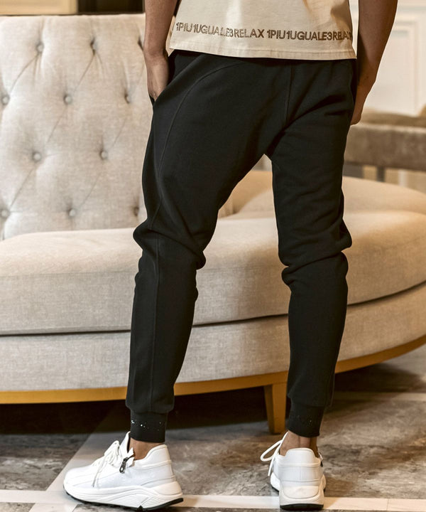 ウノピゥウノウグァーレトレリラックス　ラインストーンヘムスウェットジョガーパンツ