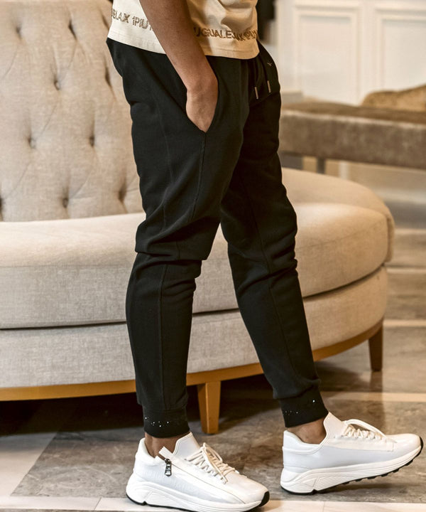 ウノピゥウノウグァーレトレリラックス　ラインストーンヘムスウェットジョガーパンツ