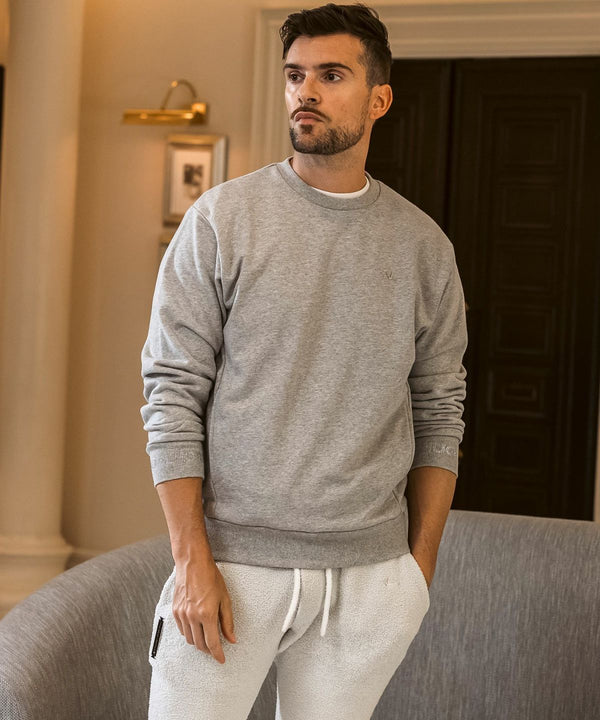 ウノピゥウノウグァーレトレリラックス　ラインストーンカフスウェットクルーネックプルオーバー