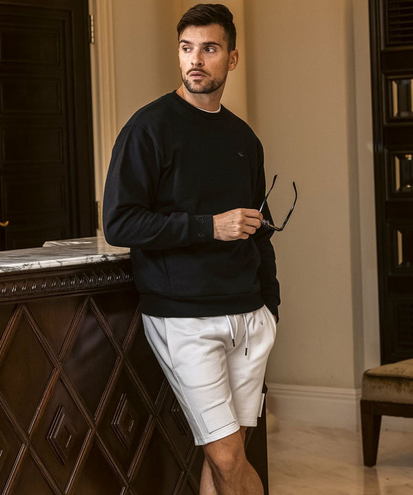 ウノピゥウノウグァーレトレリラックス　ラインストーンカフスウェットクルーネックプルオーバー