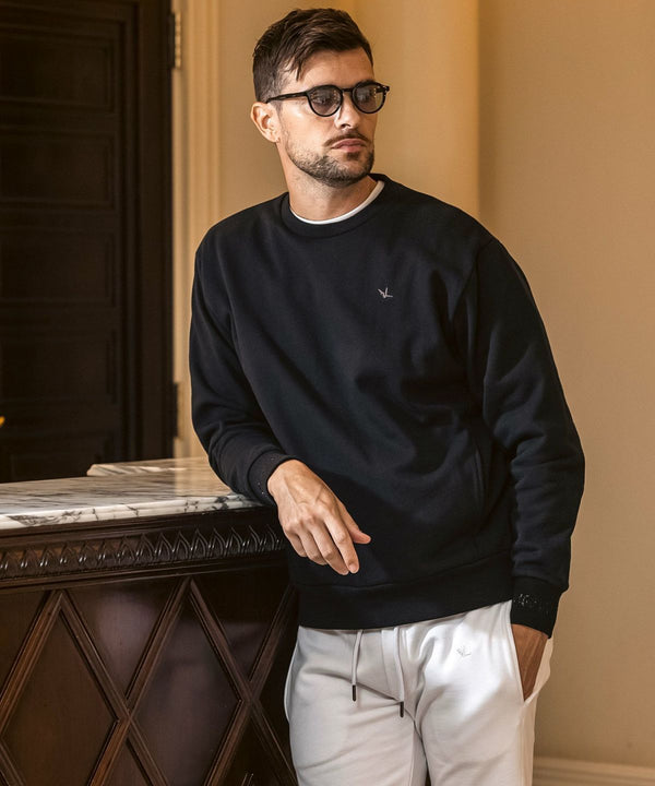 ウノピゥウノウグァーレトレリラックス　ラインストーンカフスウェットクルーネックプルオーバー