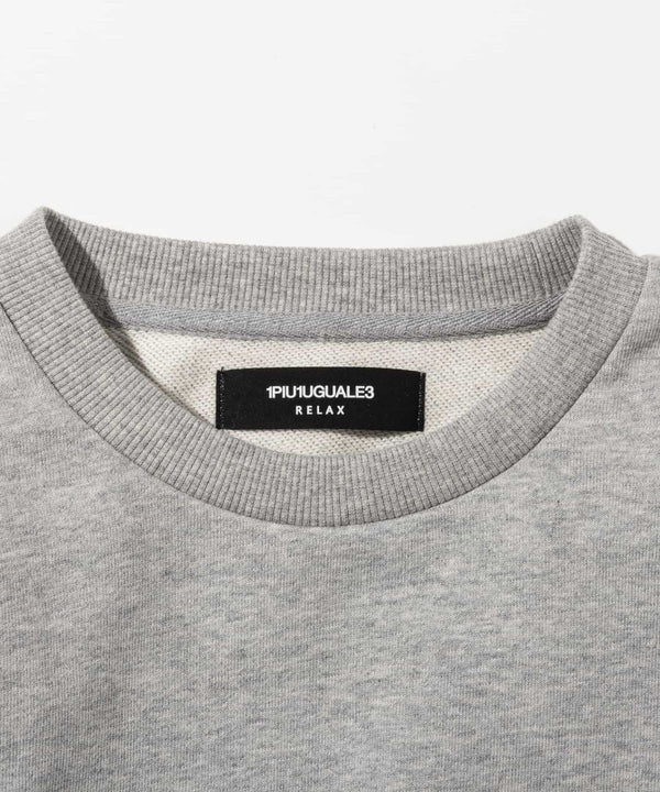 ウノピゥウノウグァーレトレリラックス　ラインストーンカフスウェットクルーネックプルオーバー