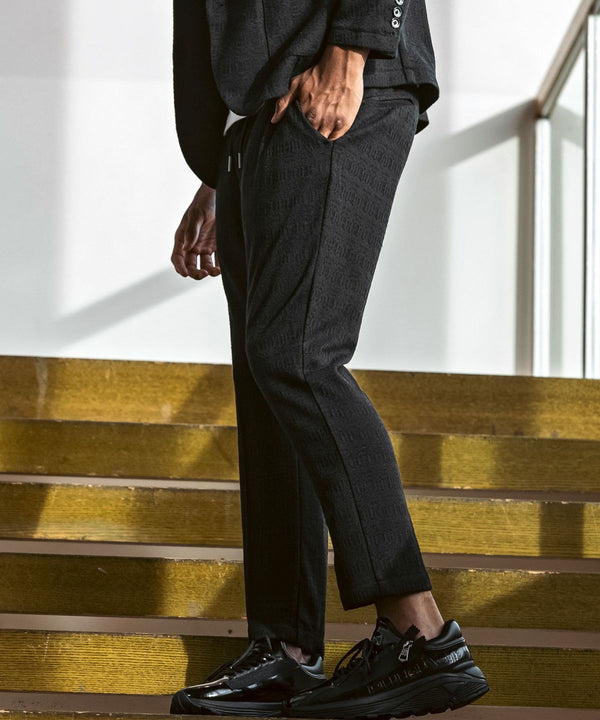 ウノピゥウノウグァーレトレリラックス　ブラックジャガードスラックス