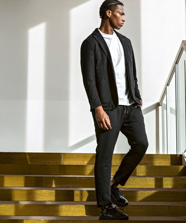 ウノピゥウノウグァーレトレリラックス　ブラックジャガードスラックス