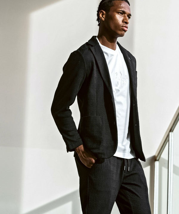 ウノピゥウノウグァーレトレリラックス　ブラックジャガードスラックス