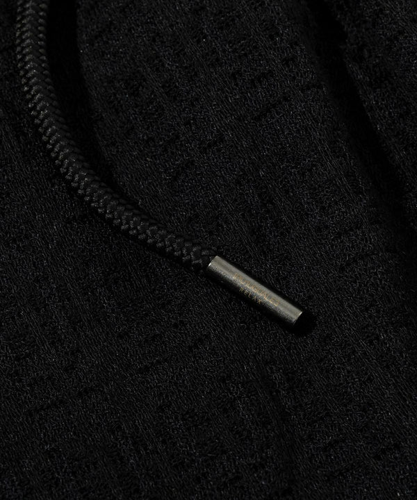 ウノピゥウノウグァーレトレリラックス　ブラックジャガードスラックス