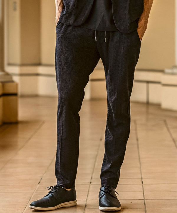 ウノピゥウノウグァーレトレリラックス　リネンブレンドジャガードスラックス