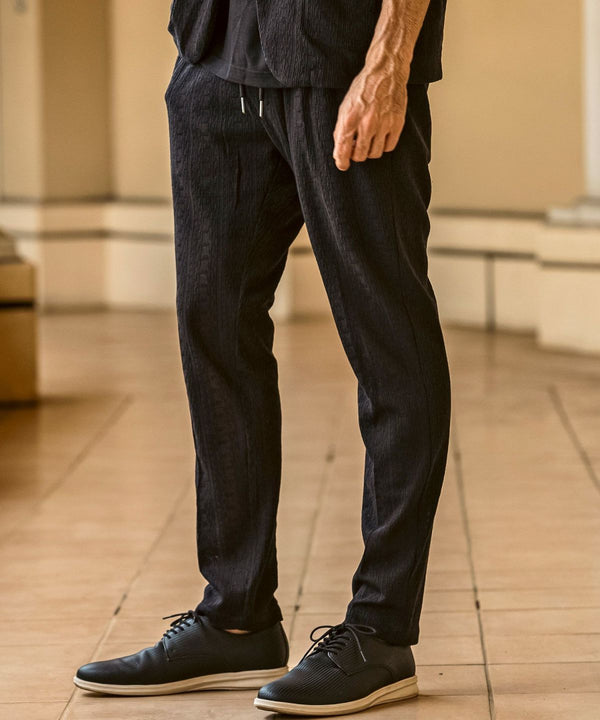 ウノピゥウノウグァーレトレリラックス　リネンブレンドジャガードスラックス