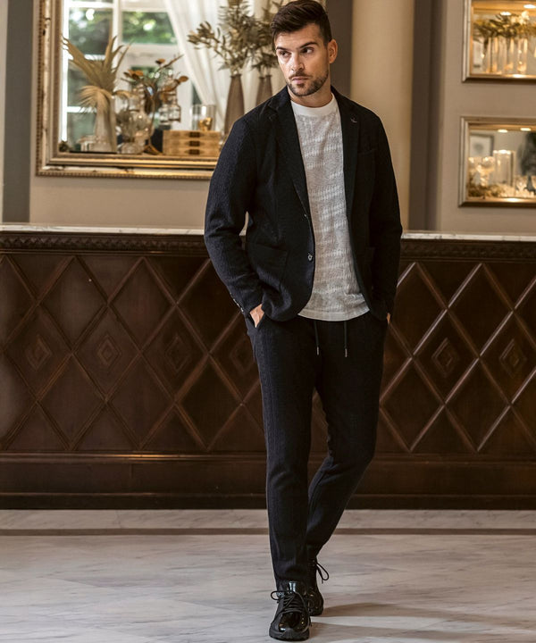 ウノピゥウノウグァーレトレリラックス　リネンブレンドジャガードスラックス