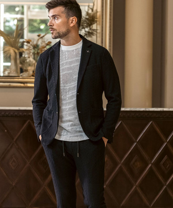 ウノピゥウノウグァーレトレリラックス　リネンブレンドジャガードスラックス