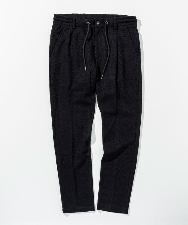 ウノピゥウノウグァーレトレリラックス　リネンブレンドジャガードスラックス